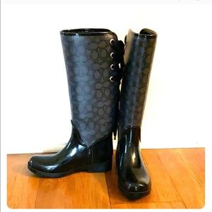 Women’s Coach rain boots size 5.